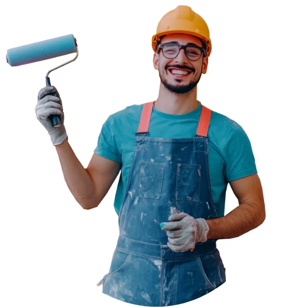 A friendly painter in an orange hard hat and overalls smiling while holding up a paint roller.